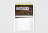Calendar page for October with a graffiti removal hotline on a wall, on a white background