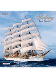 Front cover of a calendar with a sailing boat on the sea.