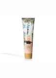 Hand cream tube with floral design on a white background