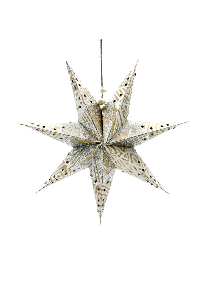 Decorative star-shaped lantern with gold and white pattern on a white background