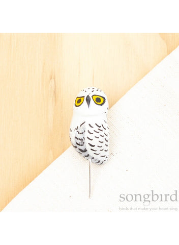 A Snowy Owl lapel or hat pin by Songbird.