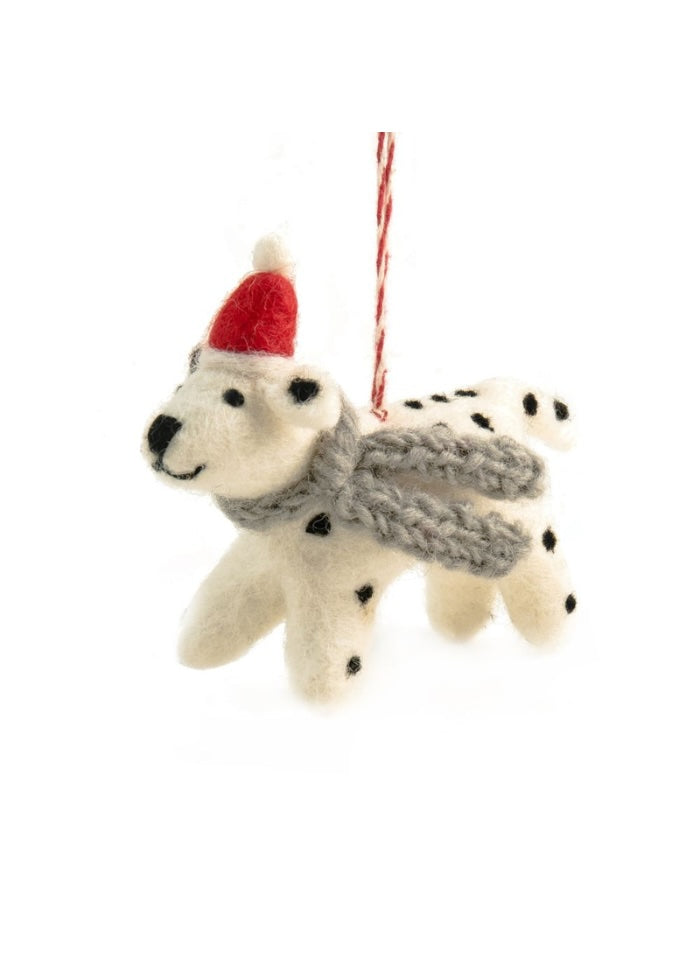 Decorative ornament of a dog wearing a red Santa hat and gray scarf on a white background