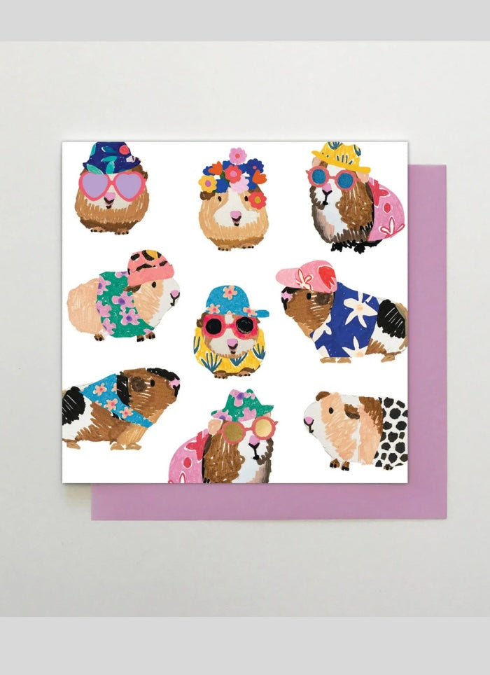 Card with illustrated guinea pigs wearing colorful accessories on a white background
