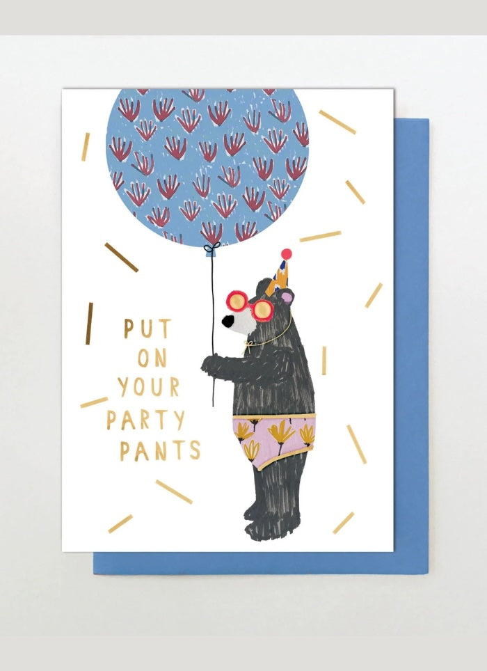 Greeting card with a bear holding a balloon and text 'Put on your party pants' on a white background.