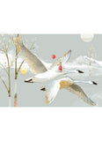 Two swans flying over a snowy landscape with a small red object and a person on a hill.