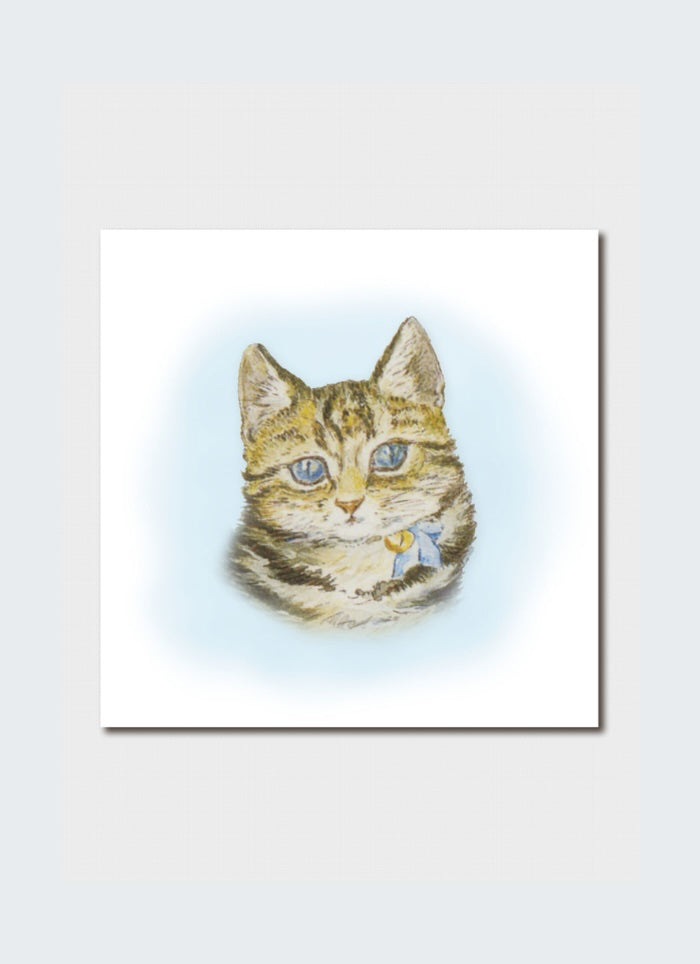 A small card with drawing of a kittens face