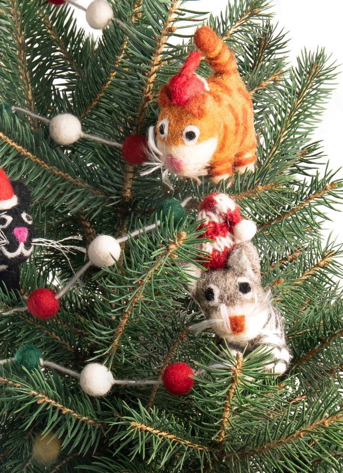 felted cat decorations displayed in tree