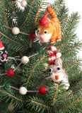 felted cat decorations displayed in tree
