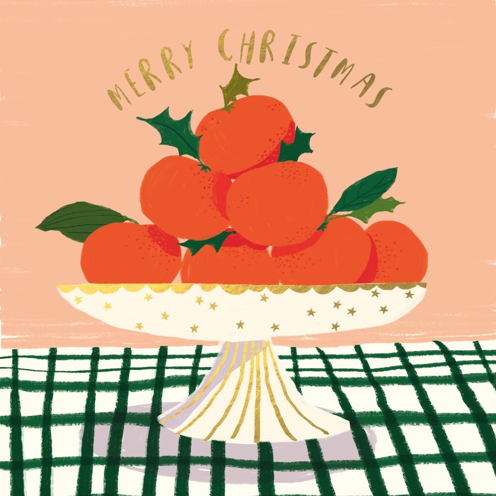 Illustration of oranges on a plate with holly leaves, 'Merry Christmas' text, and a checkered tablecloth.