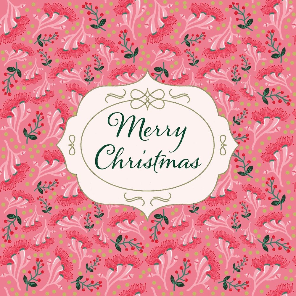 A festive Christmas graphic featuring a central cream-colored decorative label with the words 'Merry Christmas' in dark green script, set against a pink and coral patterned background with green leaves and small gold dots.