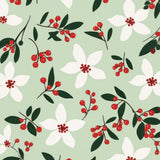 A card with green, red and white foliage, berries and flowers.