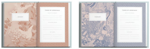 Two stationery notebooks with floral patterns on the covers and interior pages.