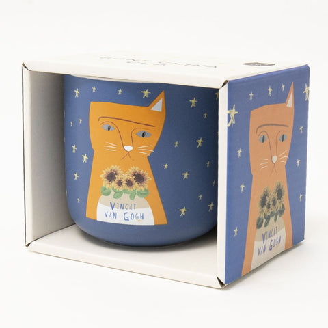 A purple mug with an orange cat - Vincat van Gogh by Niaski in it's box.