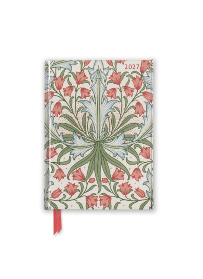 Floral patterned notebook with a red ribbon on a white background