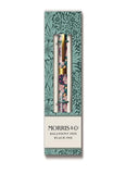 Ballpoint pen with floral design in packaging on a white background
