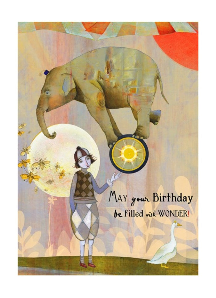 Illustration of a person with an elephant and text 'May your Birthday be filled with WONDER' on a colorful background