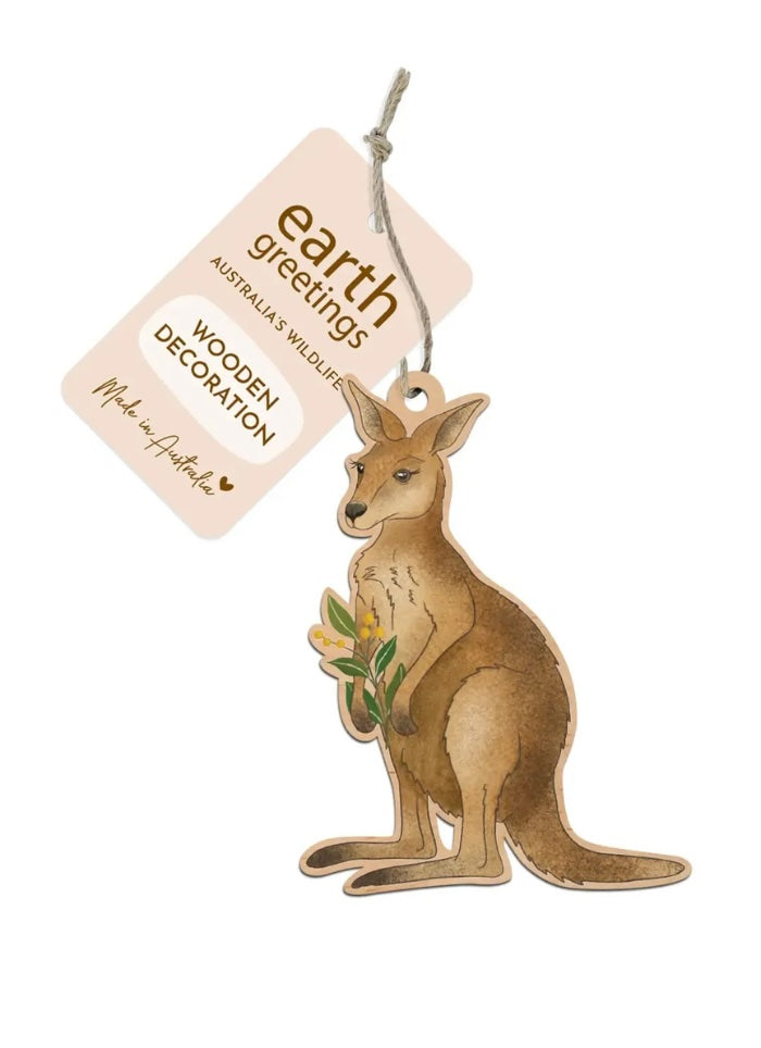Wooden kangaroo decoration with 'earth greetings' tag on a white background