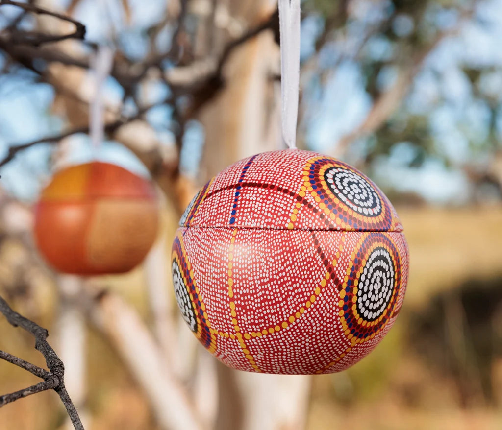 Debbie Brown Christmas bauble hanging on a tree outside in the Australian bush.