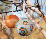A close up of Christmas ball by Jeanie Ross