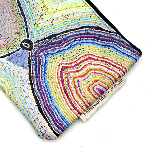 Colorful patterned product with 'betterworldwants.com.au' branding on a white background