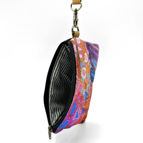 Colorful patterned pouch with a zipper on a white background