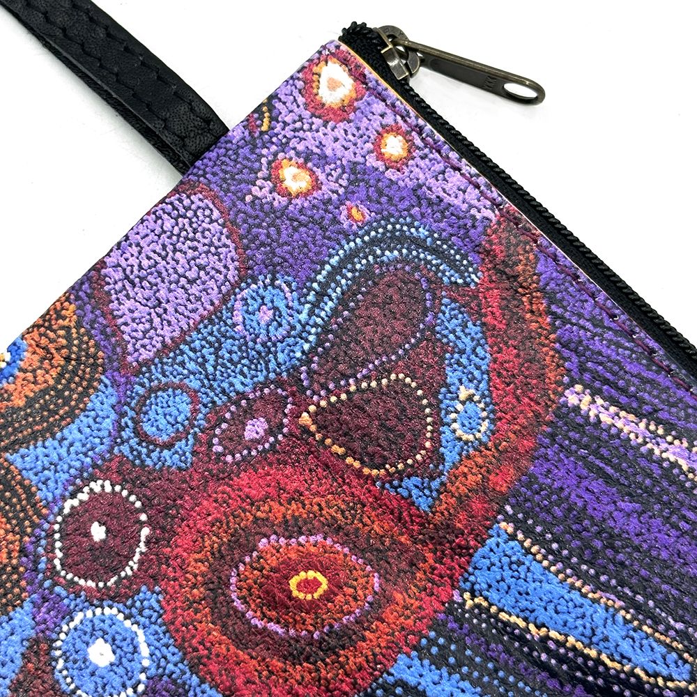 Colorful pouch with abstract design featuring purple, blue, and red colors.
