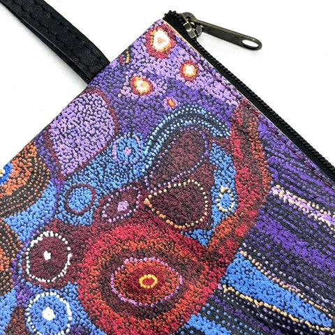 Colorful pouch with abstract design featuring purple, blue, and red colors.