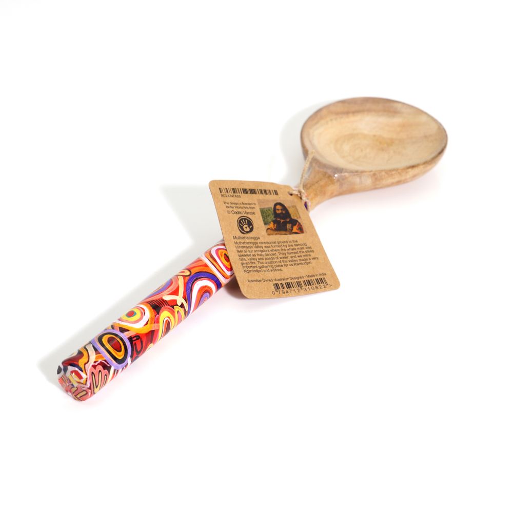 Wooden spoon with a colorful handle and a label on a white background