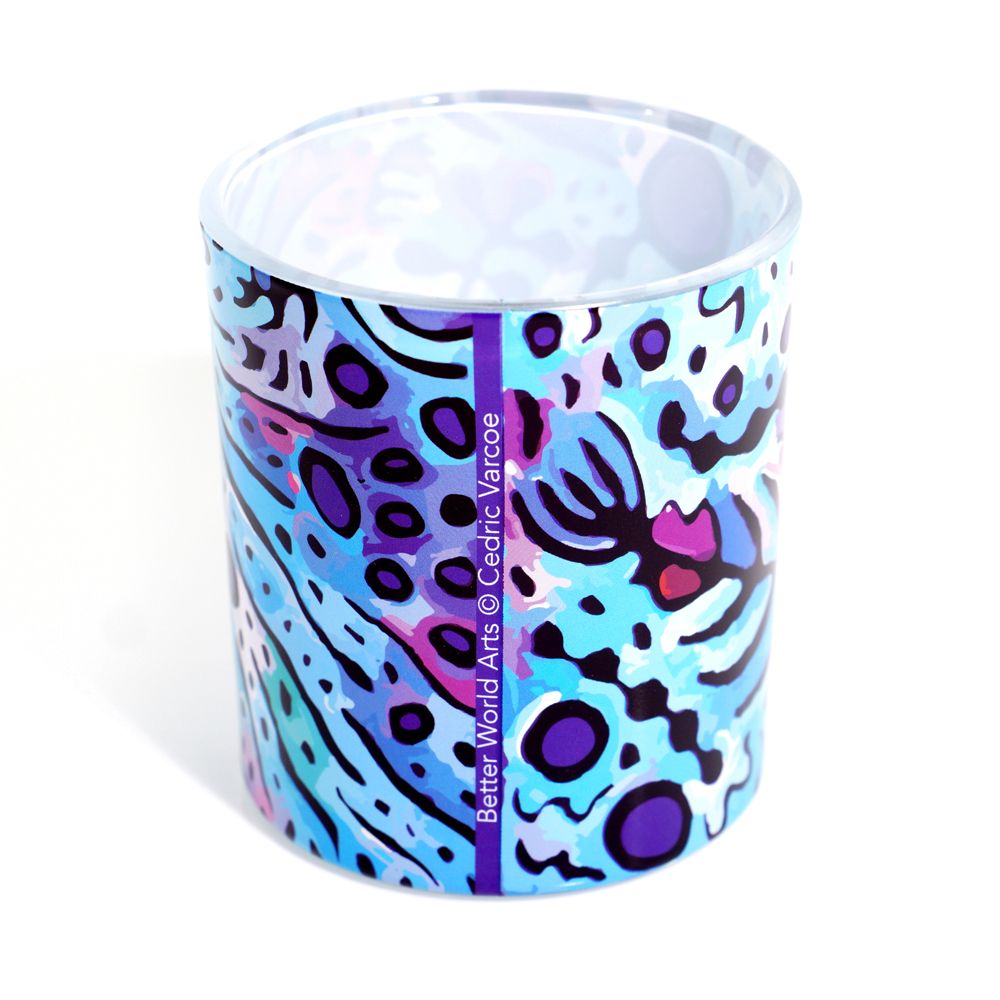 Colorful patterned cup with a white interior on a white background