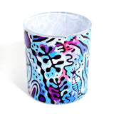 Colorful abstract patterned cup on a white background
