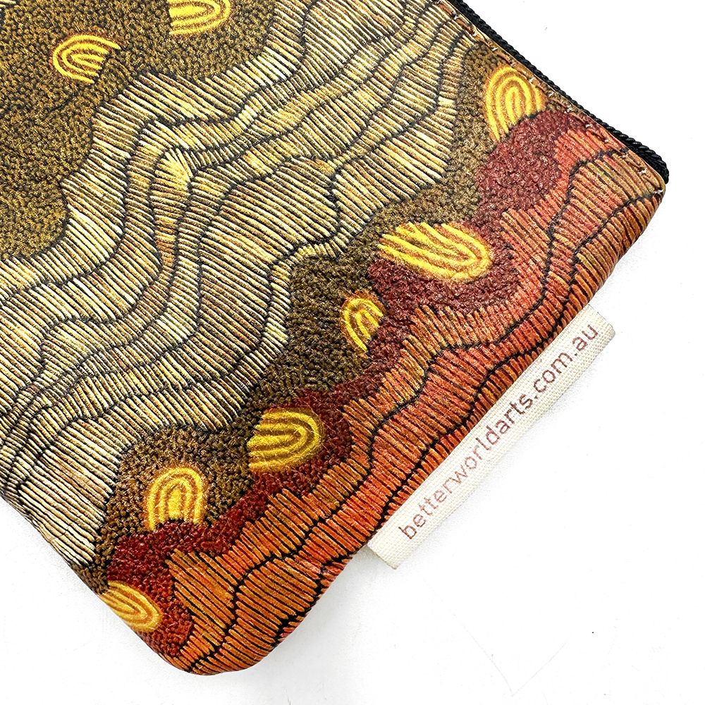 Decorative dart case with abstract pattern and 'betterworldarts.com.au' tag on a white background