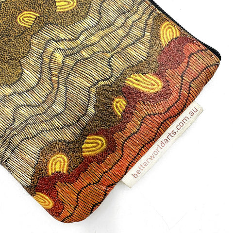 Decorative dart case with abstract pattern and 'betterworldarts.com.au' tag on a white background