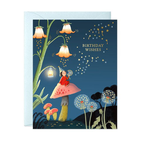 Greeting card with a fairy sitting on a mushroom under a starry night sky, with 'Birthday Wishes' text.