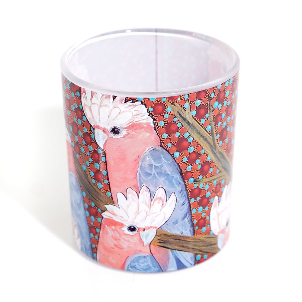 Cup with a colorful parrot design on a white background