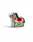 Decorative horse figure with red and black details on a white background