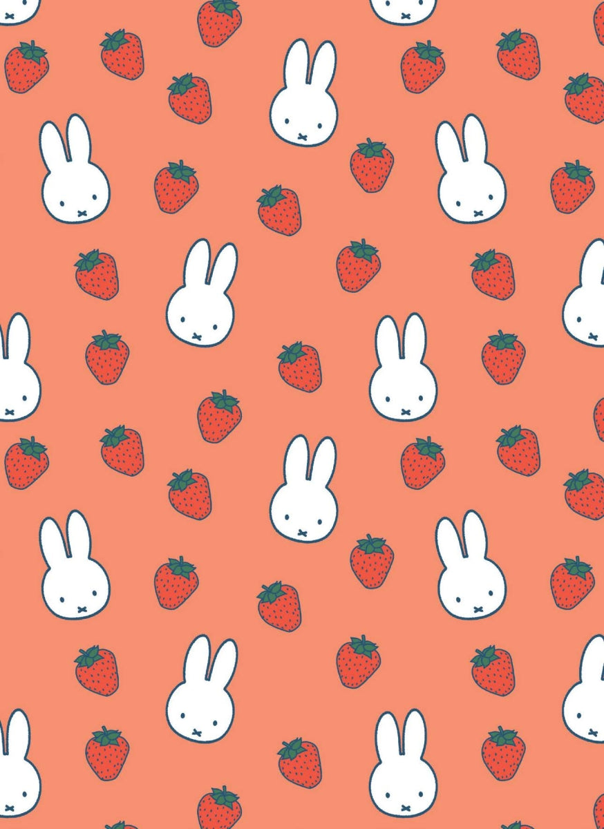 Pattern of cartoon bunnies and strawberries on a peach background