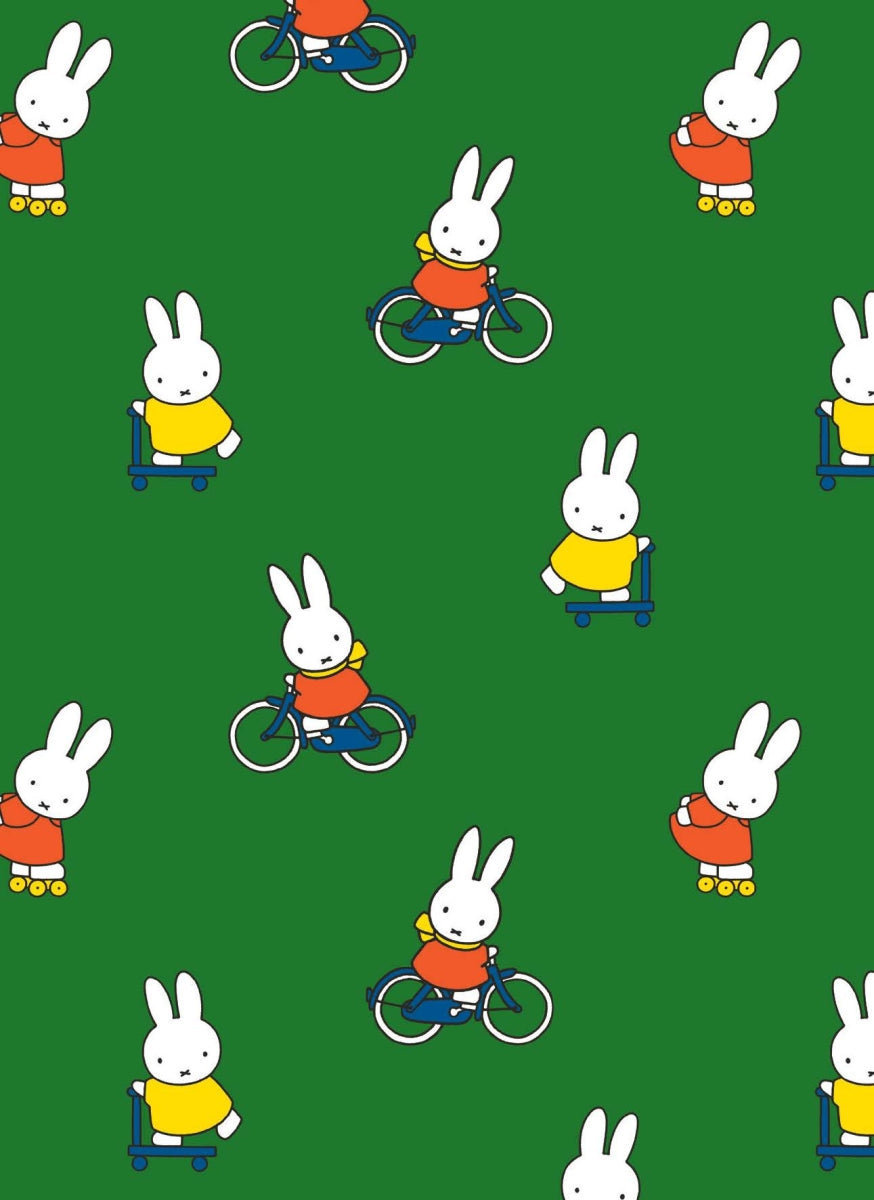 Pattern of cartoon bunnies on a green background