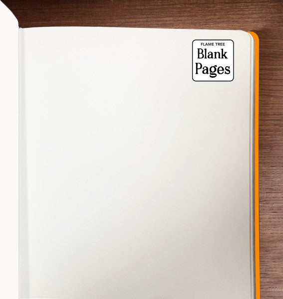 Blank notebook with 'Flame Tree Blank Pages' label on a wooden surface