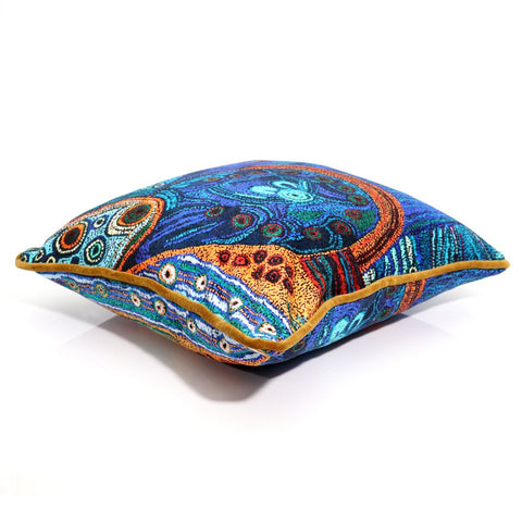 Decorative pillow with intricate patterns on a white background