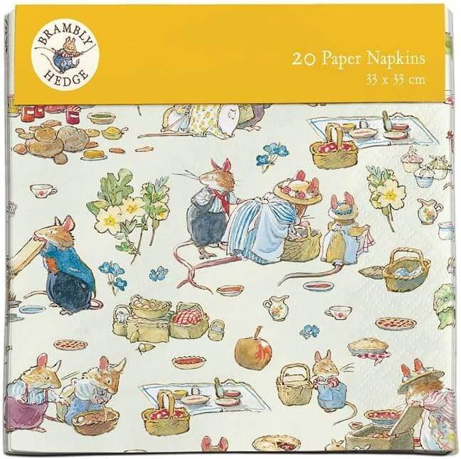 A pack of paper napkins with mice dressed up preparing a picnic.