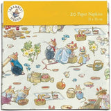 A pack of paper napkins with mice dressed up preparing a picnic.