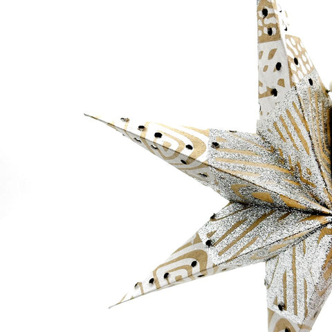 Close up of paper star with glitter
