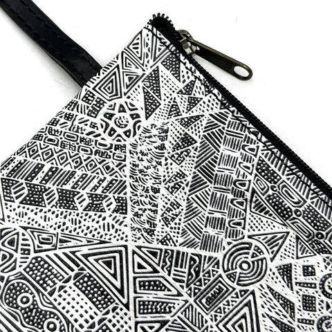 Zipper pouch with black and white geometric pattern on a white background
