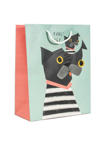 A blue gift bag by Niaski with a pug dog in a black and white striped top and large yellow eyes.