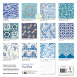 Calendar cover with various blue patterns and designs on a white background