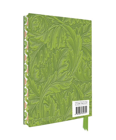 Green notebook with embossed leaf design on a white background